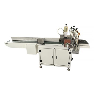 Machine d'emballage de serviettes en papier